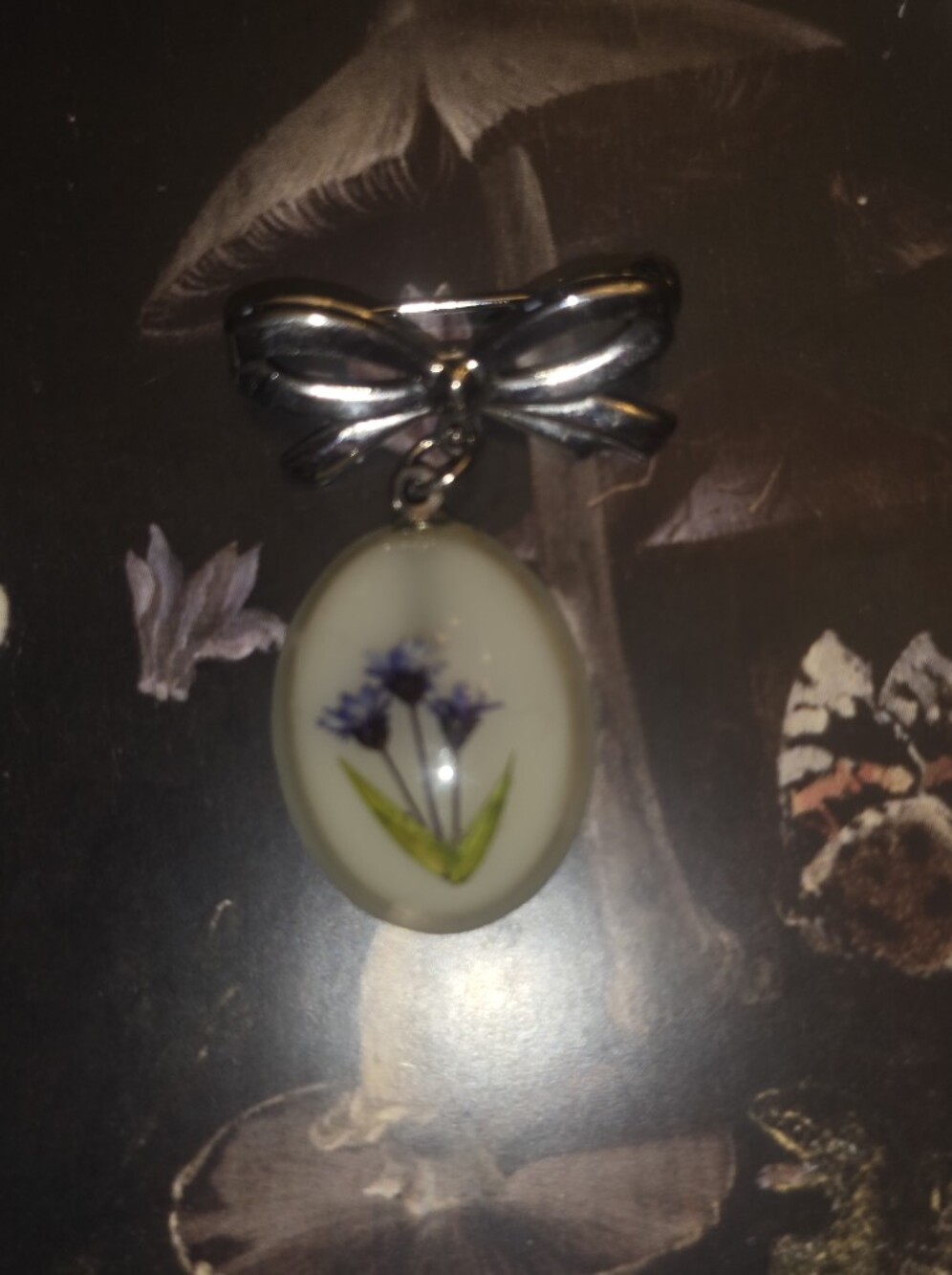 Vintage Pressed Purple Flower Resin Cabochon On Metal Bow